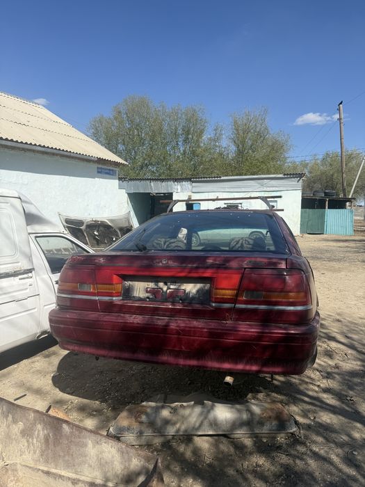 Легковые автомобили Мазда 626