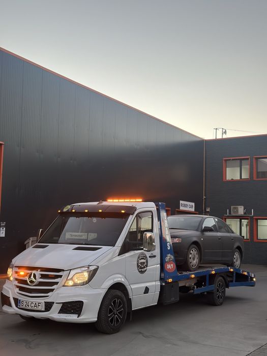 Tractari auto 24/24  Platforma auto Iasi Transport Auto pe Platforma