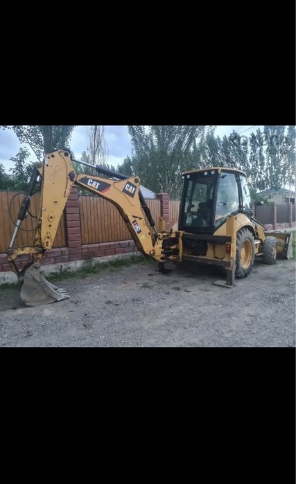 Услуги экскаватор погрузчик3в1.