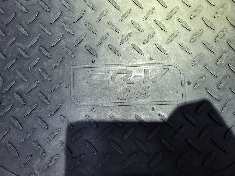 Коврик в багажник.