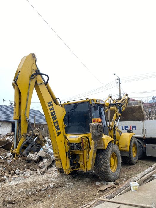 Servicii cu Buldoexcavator
