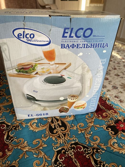 Вафельница новая подарил