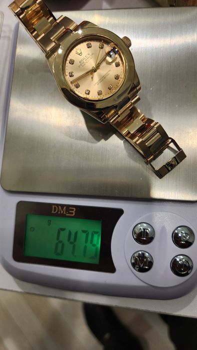 Золотые часы Rolex