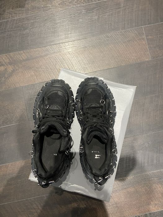 Balenciaga defender piercings