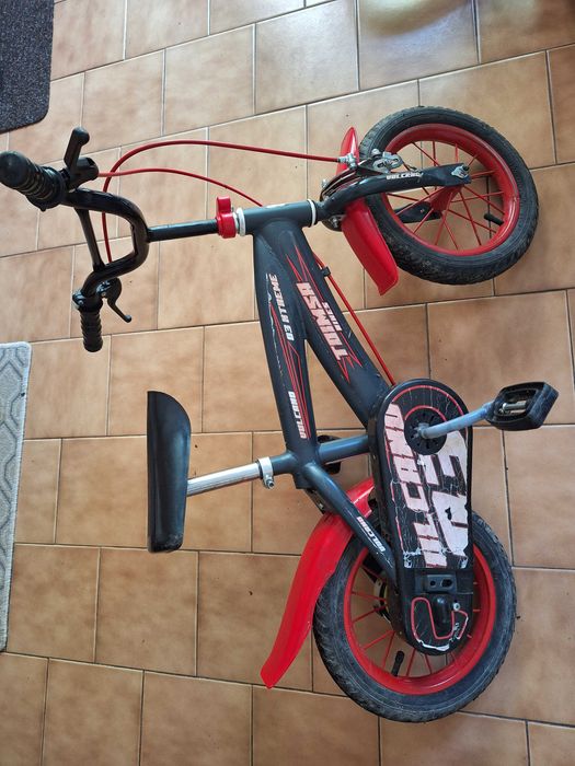 Bicicleta copii Toimsa Vulcano, 12 inch cu roti ajutatoare in stare impecabila
