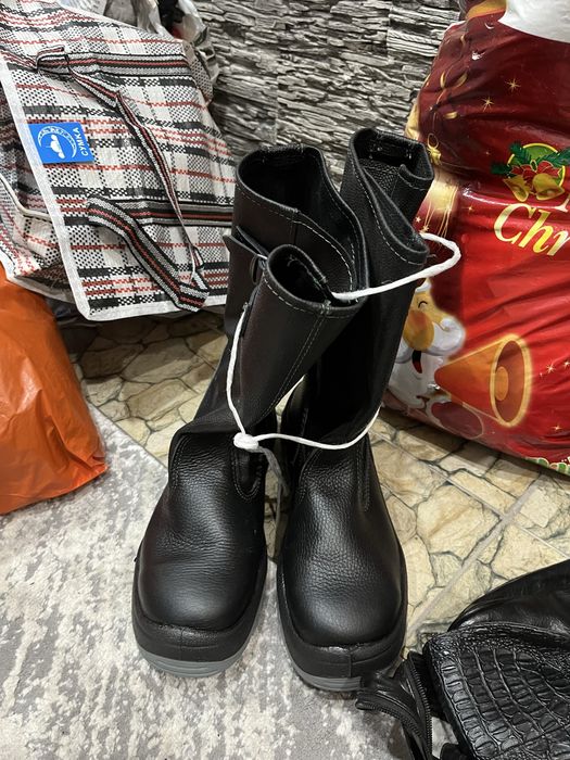 Продам новые сапоги
