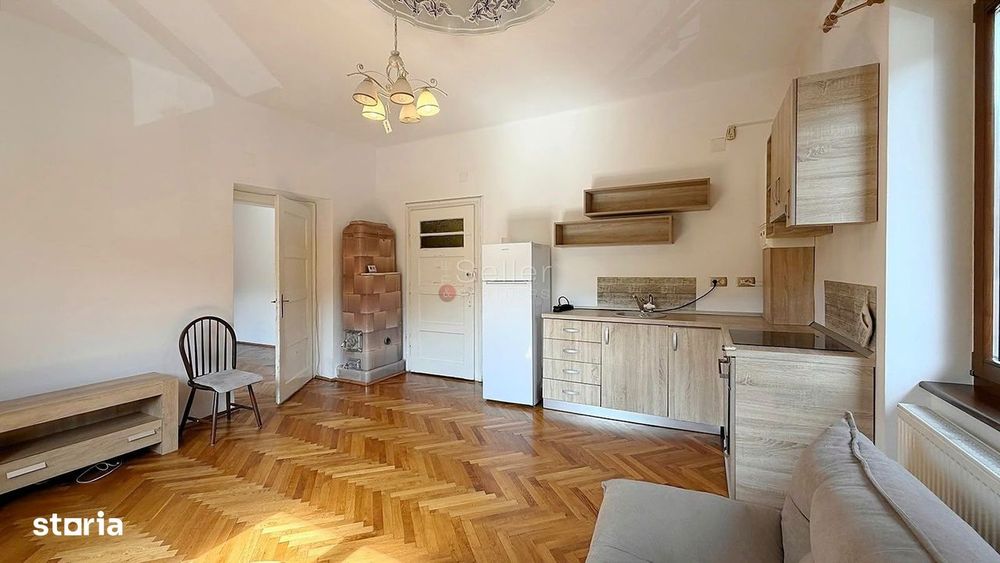 Apartament cu Acces la Curte Garaj Inclus