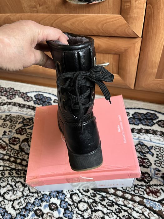 Продам новые сапоги