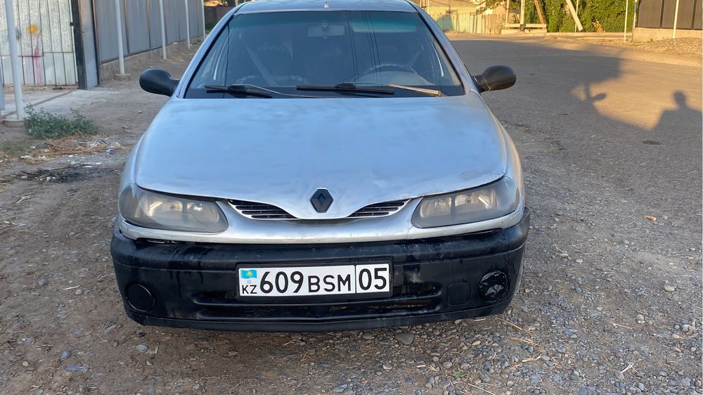 Renault laguna ……………