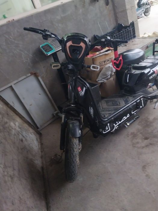 Скутер электравелосипед