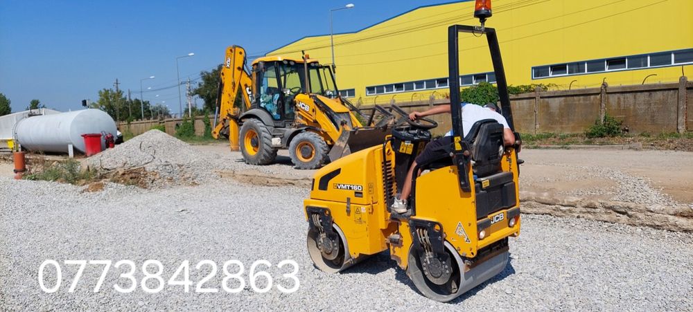 defrișari , excavații , demolari , buldoexcavator cu picon