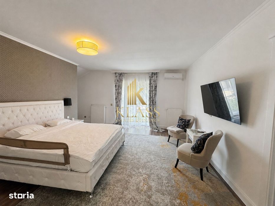 Casa moderna pentru inchiriere cu 4 dormitoare, gradina privata plus g