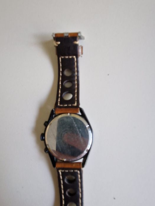 Часы Citizen Eco Drive.