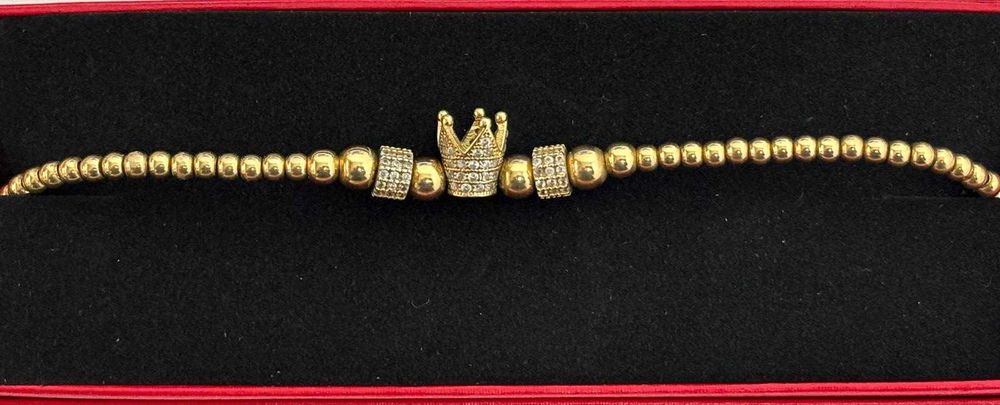 Bratara snur cu bile si coroana din aur galben de 14k