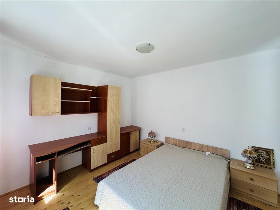 Casa individuala cu 2 corpuri de cladire si teren 625 mp