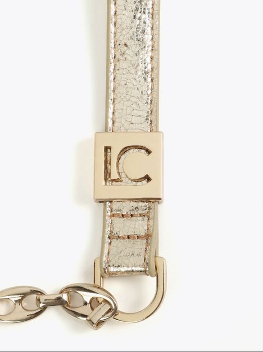 Златиста чанта Lola Casademunt