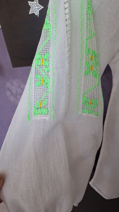 Ie, maneca lunga,.cusuta manual