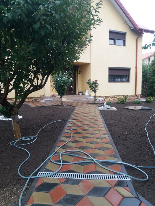 Montaj. pavaje borduri rigole piatra travertin gazon județul Iași