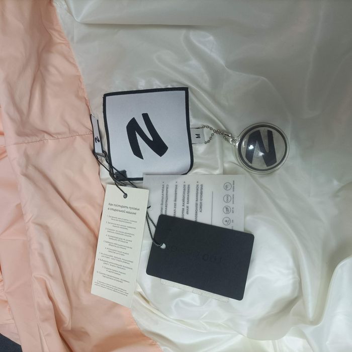 Продам пуховик натуральный