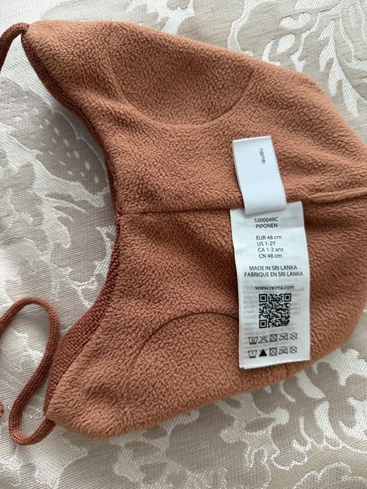 Продам зимнюю шапку Reima