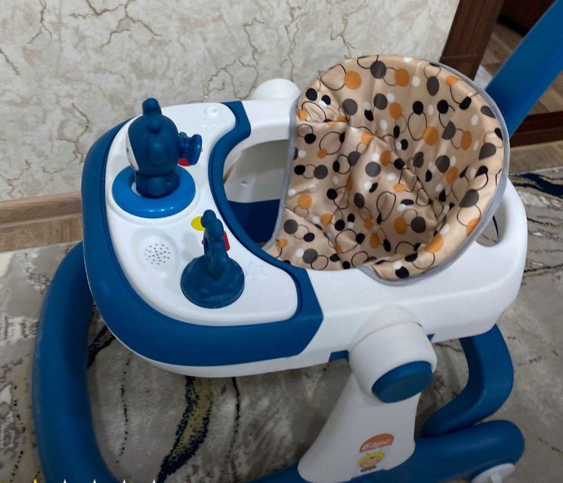 Музыкальный детский ходунок