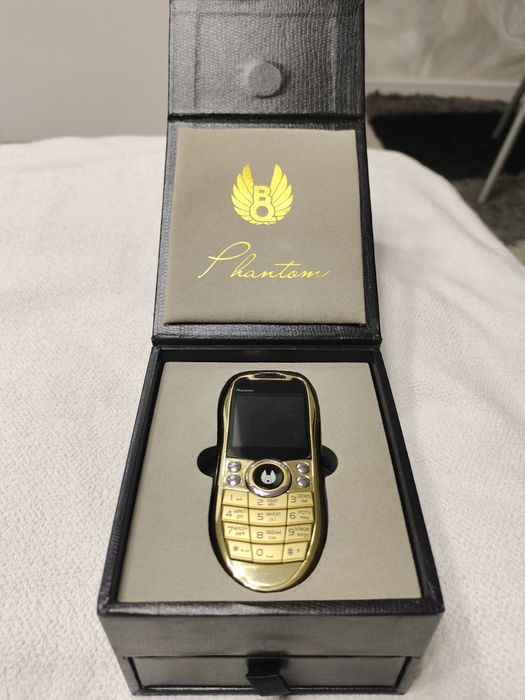 Телефон - оригинальный дизайн.