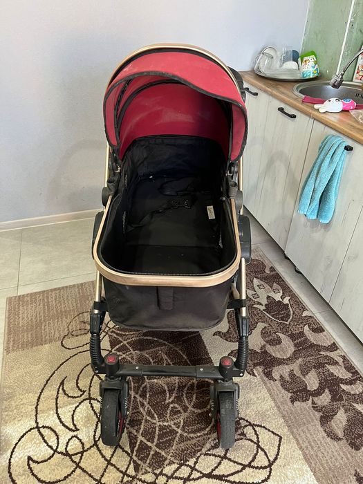 Продам коляску и стульчик для кормления