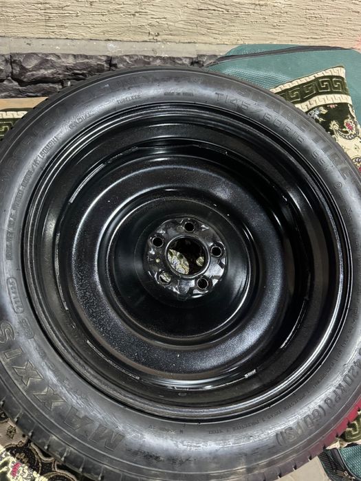 Запасное колесо ( докатка).