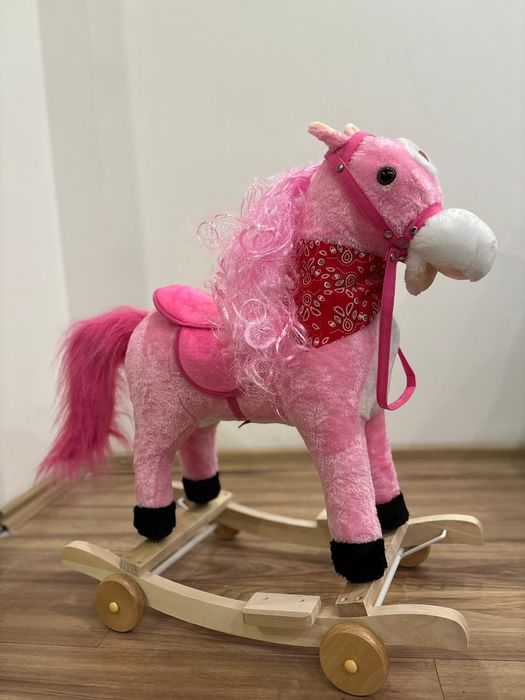 РОЗОВО ДЕТСКО КОНЧЕ ЛЮЛКА със звуци и колелца -  два модела