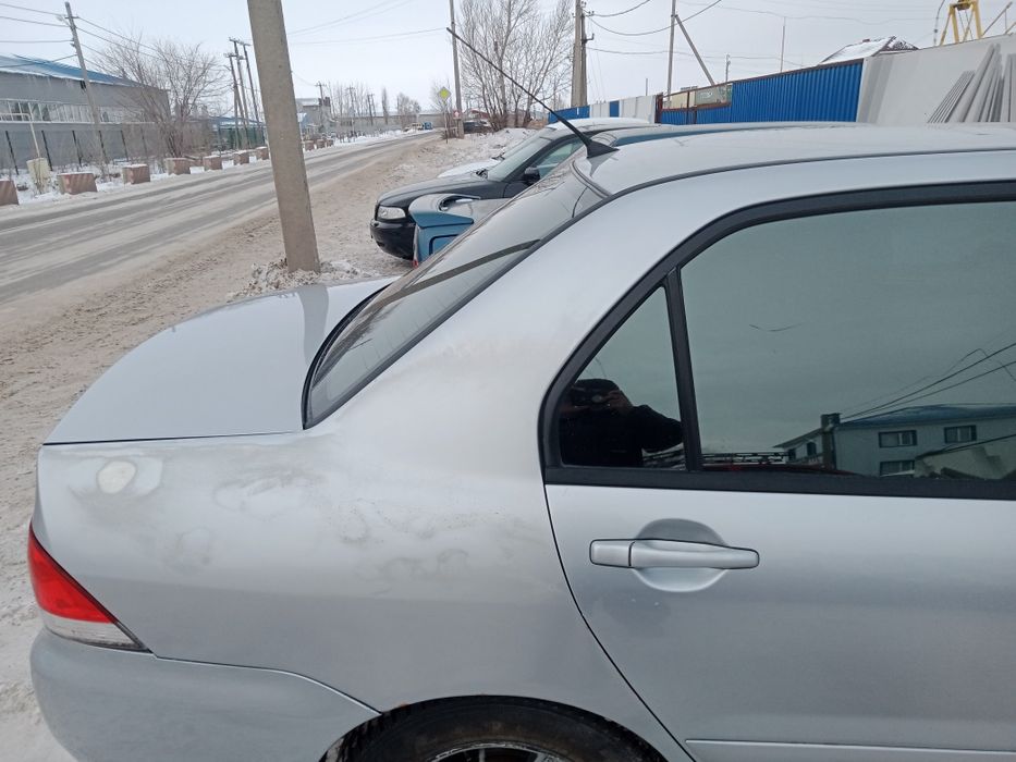 Мицубиси Лансер 9