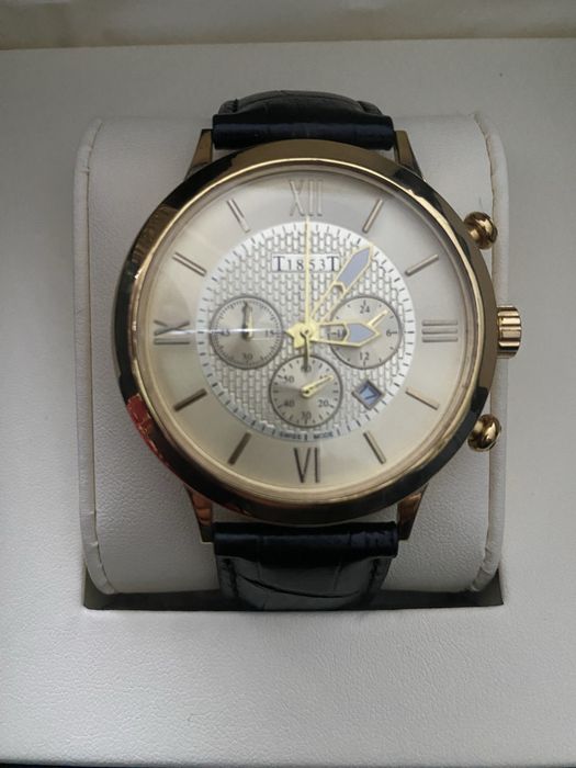 Продаётся золотые часи Tissot T+