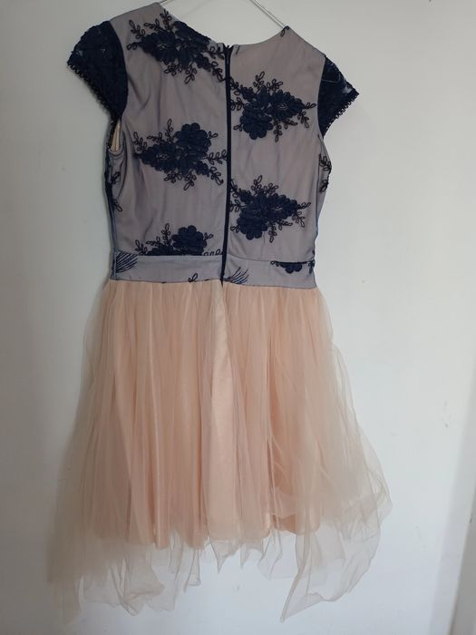 Vand rochita scurta marime L  impecabila.