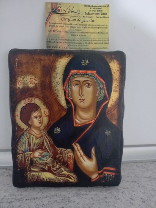 Icoana pictura pe lemn cu foita de aur "Maica Domnului cu Fiul" de la Patriarhia Romana noua cu certificat de garantie.
Dimensiune 18 x 20 cm