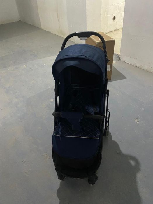 Детская прогулочная коляска