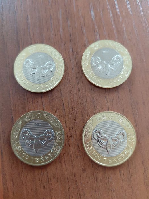 Поодам коллекционные монеты ( тенге)