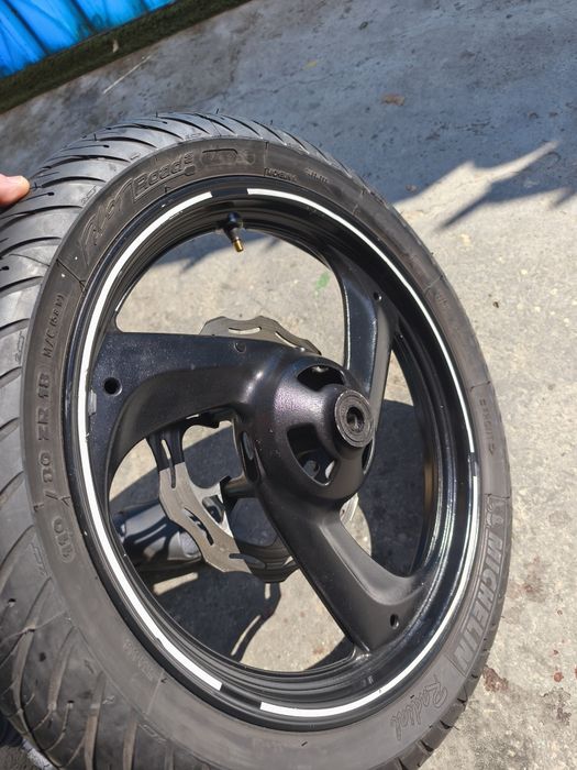Cauciuc cu tot cu jantă 110/80 zr 18