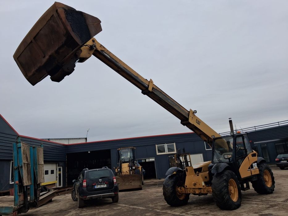 Incarcator telescopic Caterpillar TH340B

An fabricatie 2004
9300 ki