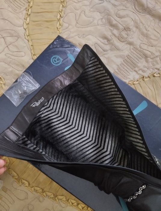 Кожаные сапоги на каблуке