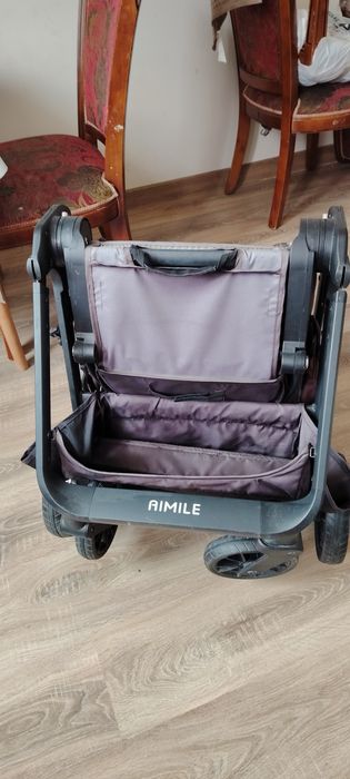 Продам детскую прогулочную коляску Aimile