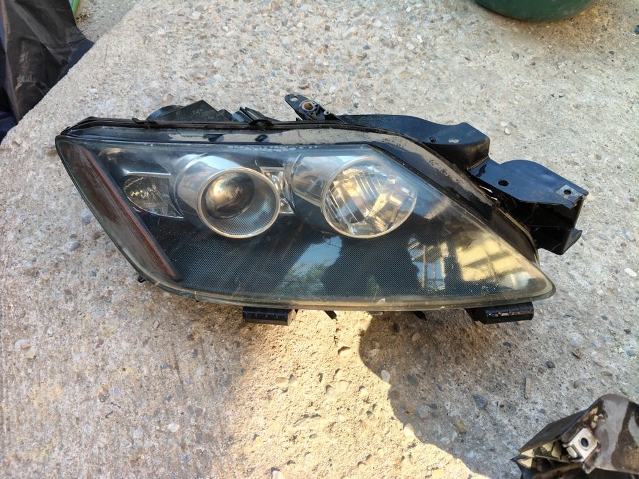 Far xenon Mazda cx 7 an 2008