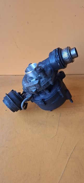 Турбокомпресор турбина турбо Garrett GT1749V OEM 03G145702F  758219 Audi A4 B7 8E A6 C6 4F2 4F5 VW Passat B6 3C 2.0 TDI 140 к.с.