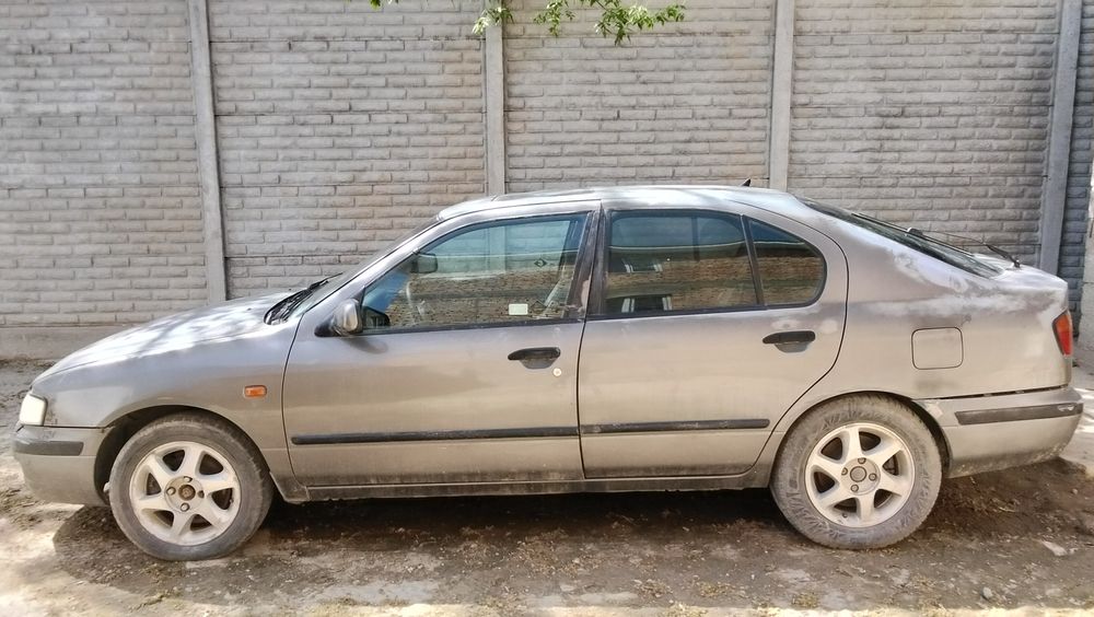 Ниссан Примера P11