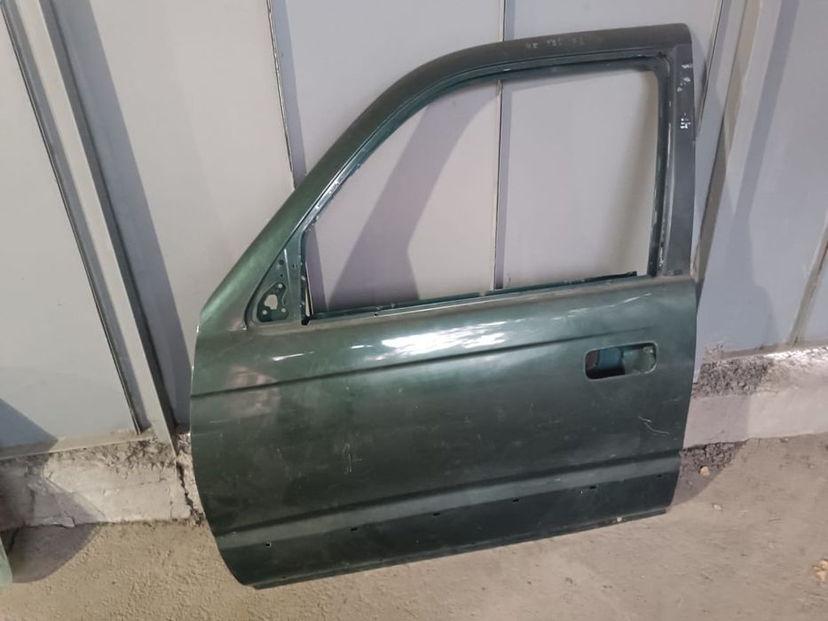 Дверь передняя левая surf 185
