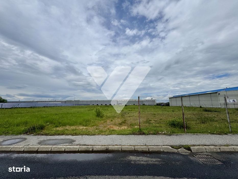 Teren intravilan industrial 11.059 mp, PUZ aprobat, asfalt - zona Vest