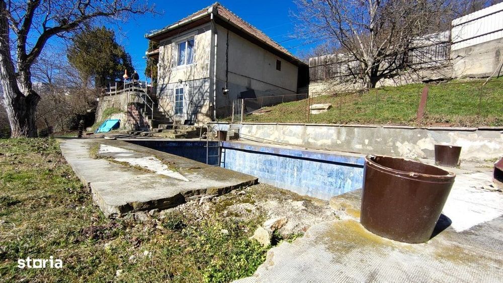 Teren intravilan de 1560 mp, front de 26 m, cu casa S+P, in Grigorescu