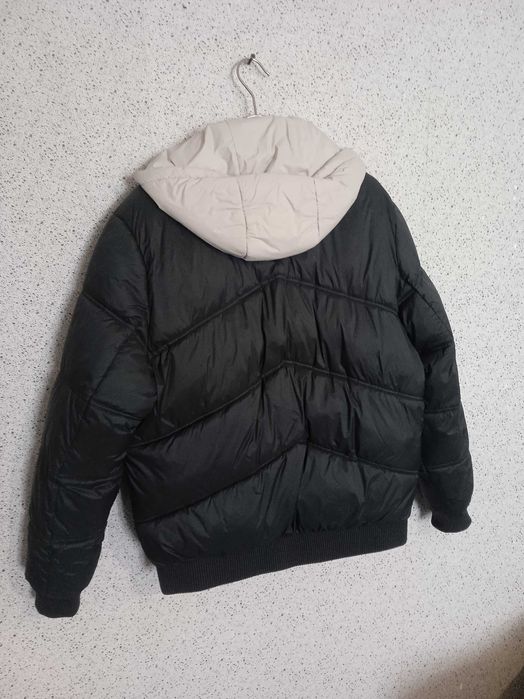 пуховик торг почти новый
