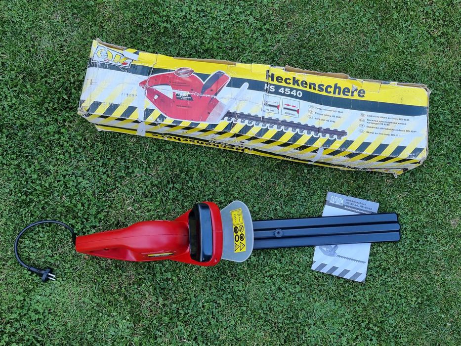 Trimmer pentru tuns gard viu, Masina de tuns tuia