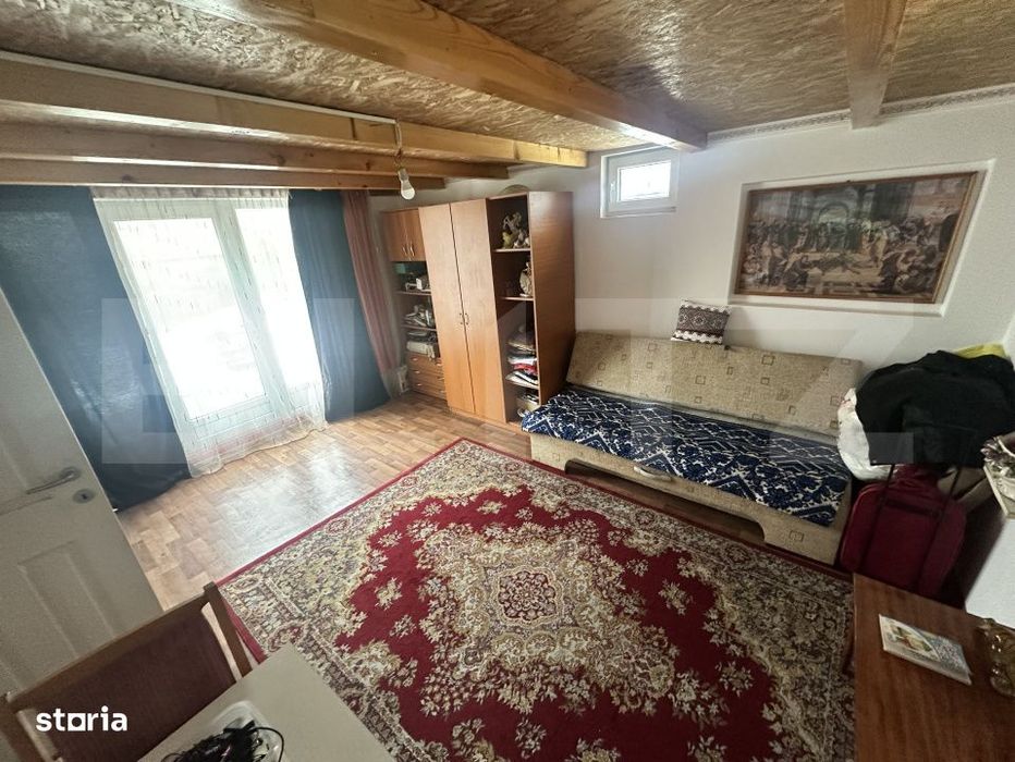 Apartament de locuit + atelier auto + terasa si curte generoasa