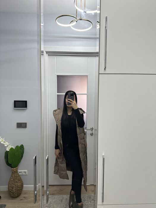 Жилетка пуховая