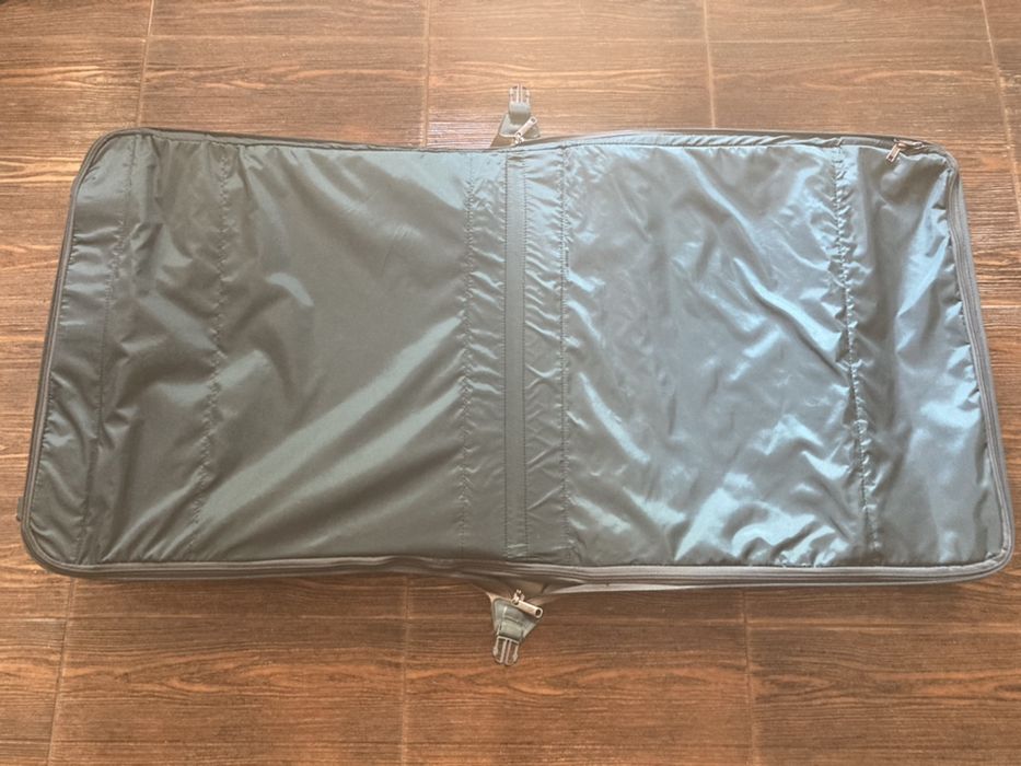 Troller samsonite , stare buna,dimensiuni 59/59/25 cm.